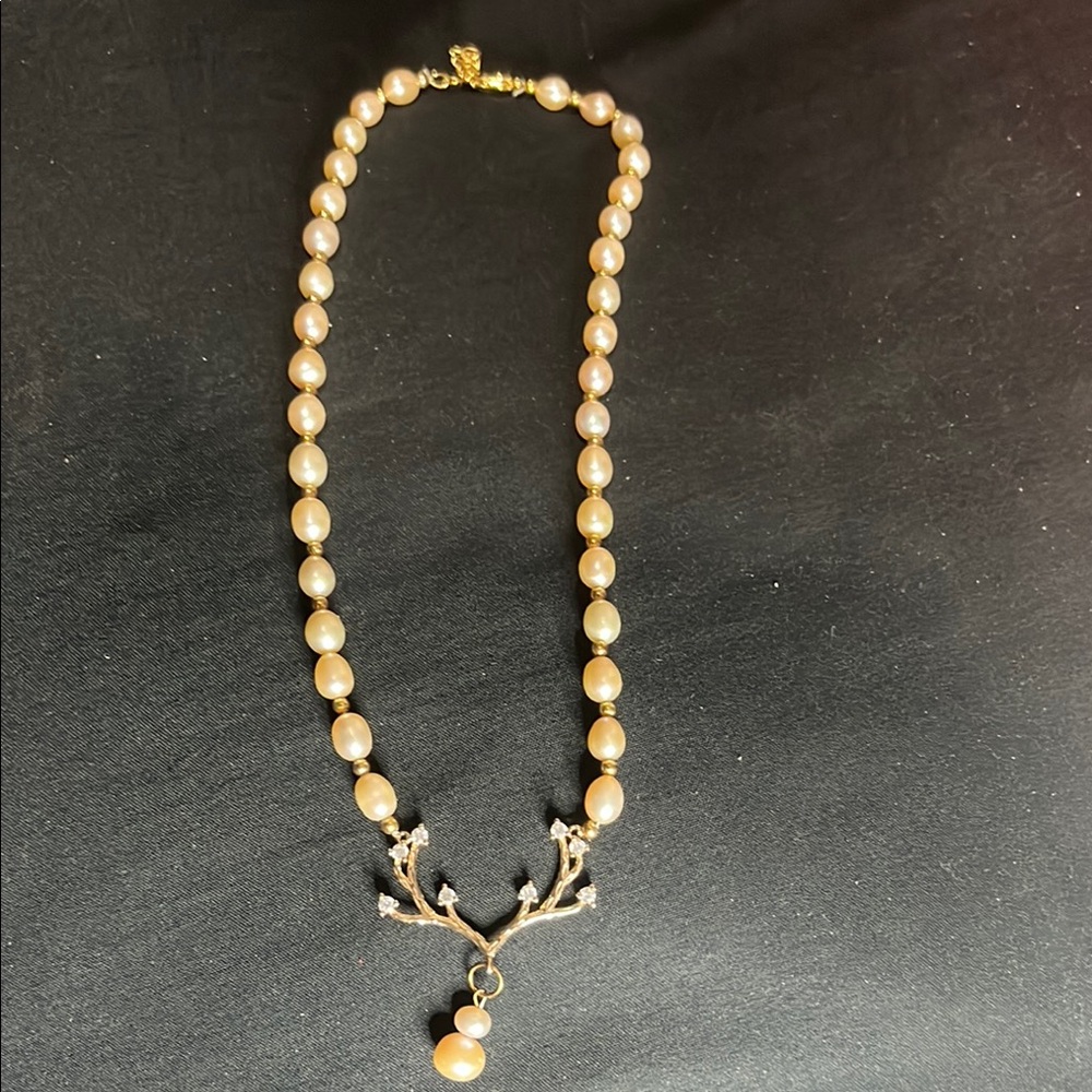 Elegant Pearl Necklace with Gold Accents